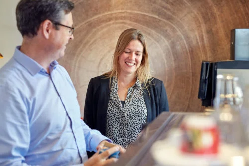 Festina Finance employees makes coffee and laughs